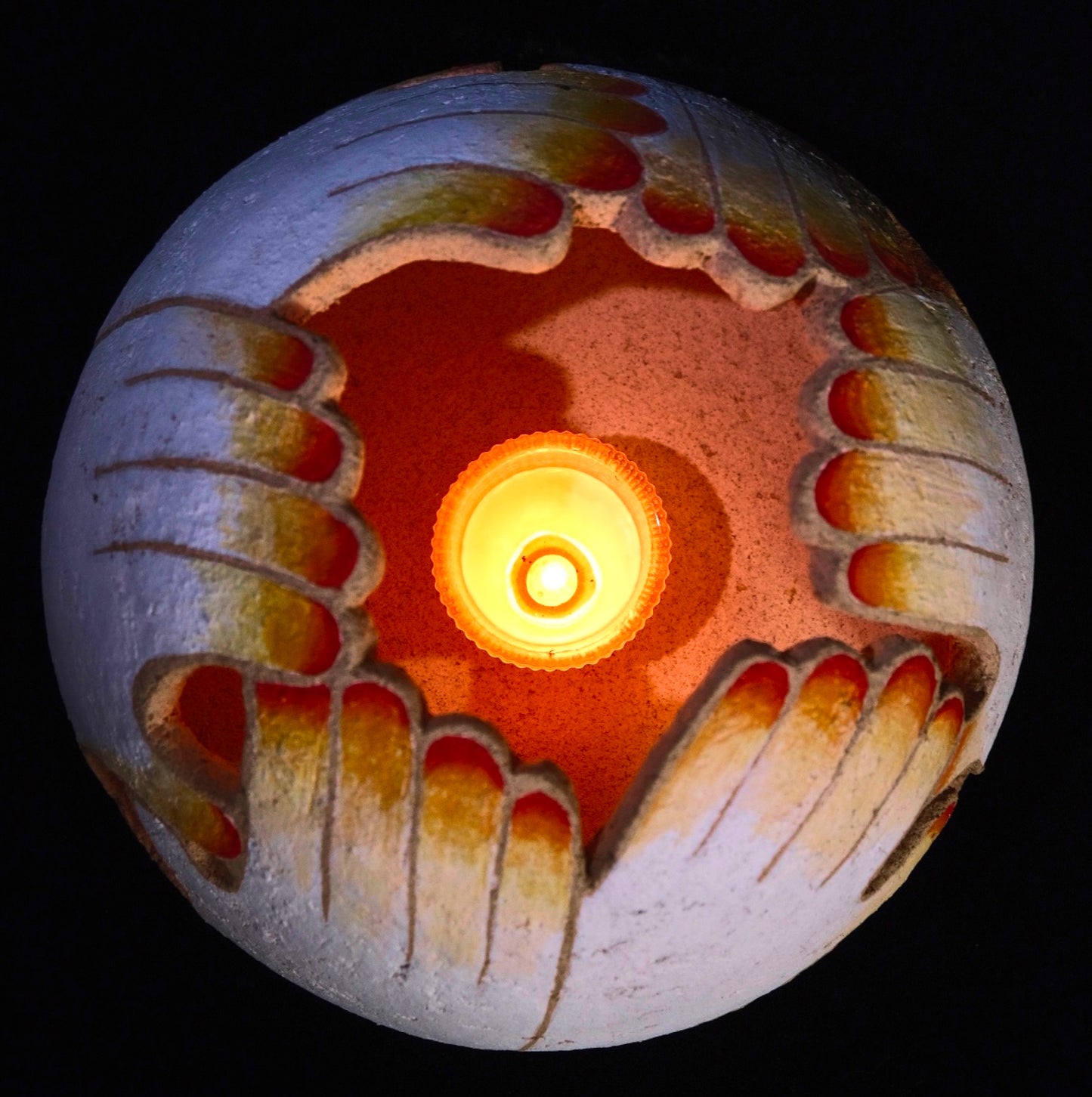 Xin Li: Hand-molded ceramic Candlelight installation